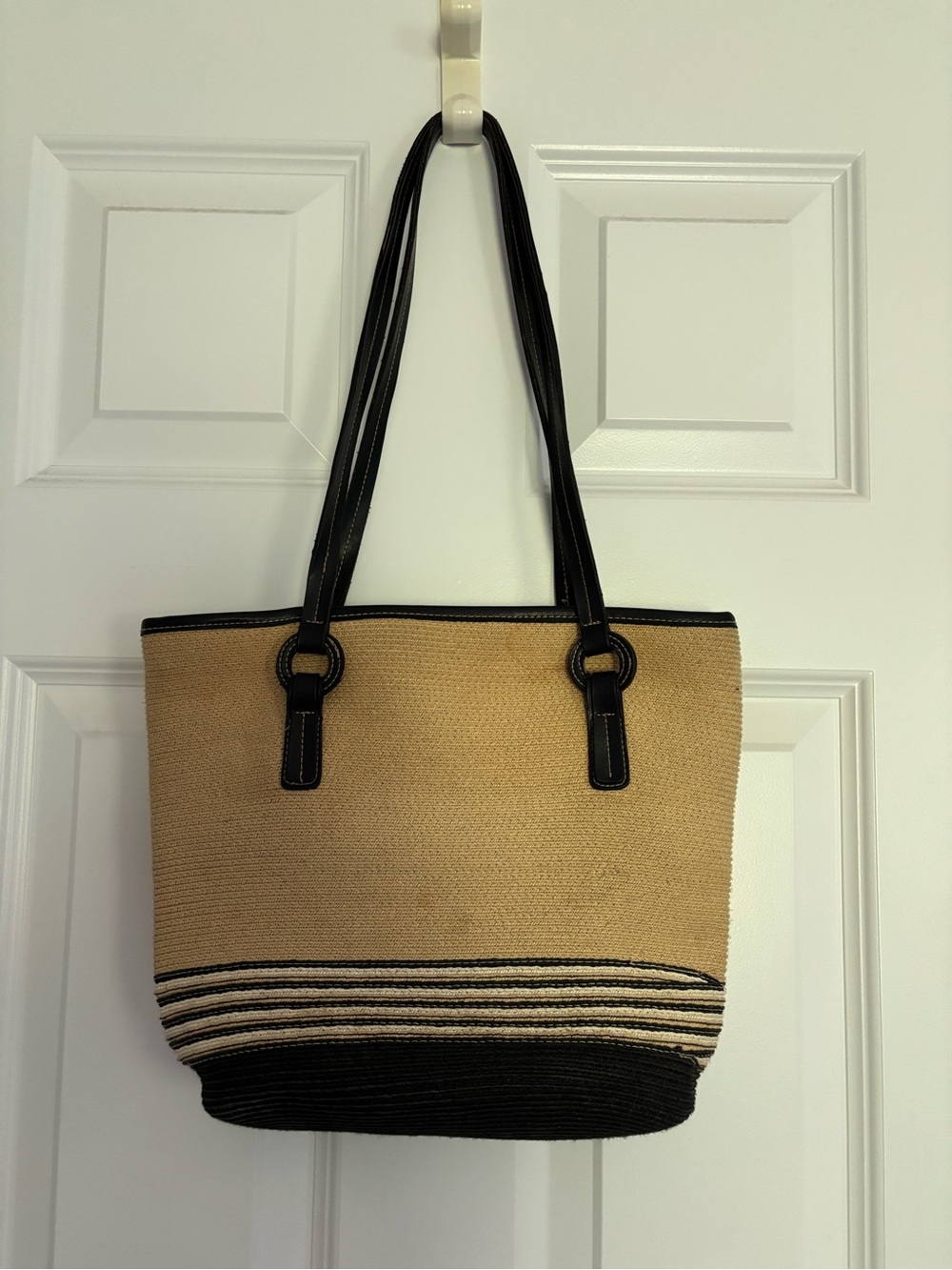 Woven Straw Tote Bag with Black Trim and zipper enclosure